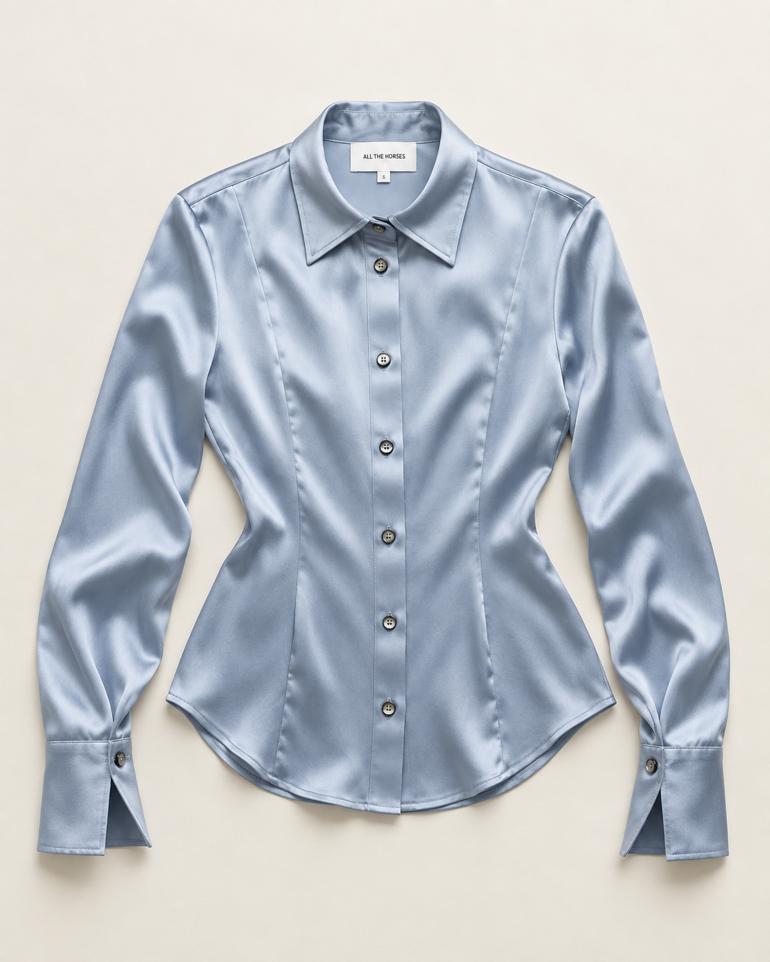 The Daisy silk blouse product shot in Ice Melt Blue